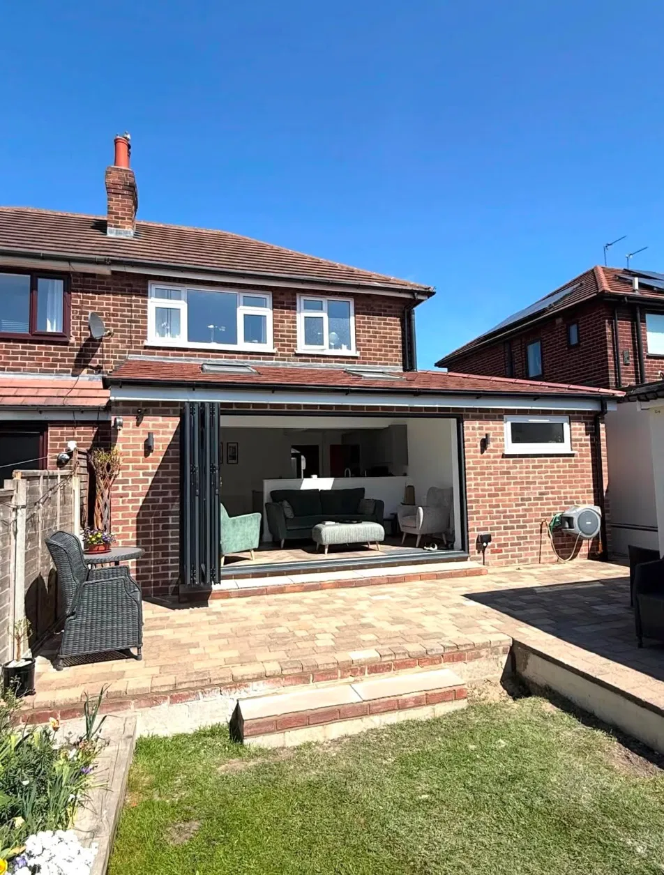 Extension with bifold doors open onto the garden
